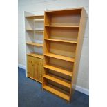 A WHITE FINISH AND PINE OPEN BOOKCASE, with an arrangement of shelving and a double cupboard door,