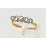 A YELLOW METAL, FIVE STONE DIAMOND RING, set with five graduating, old cut diamonds, estimated total