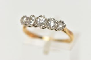 A YELLOW METAL, FIVE STONE DIAMOND RING, set with five graduating, old cut diamonds, estimated total