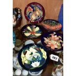 FIVE MOORCROFT PIN DISHES, comprising a 2003 'Plevriana' pattern designed by Moorcroft senior artist