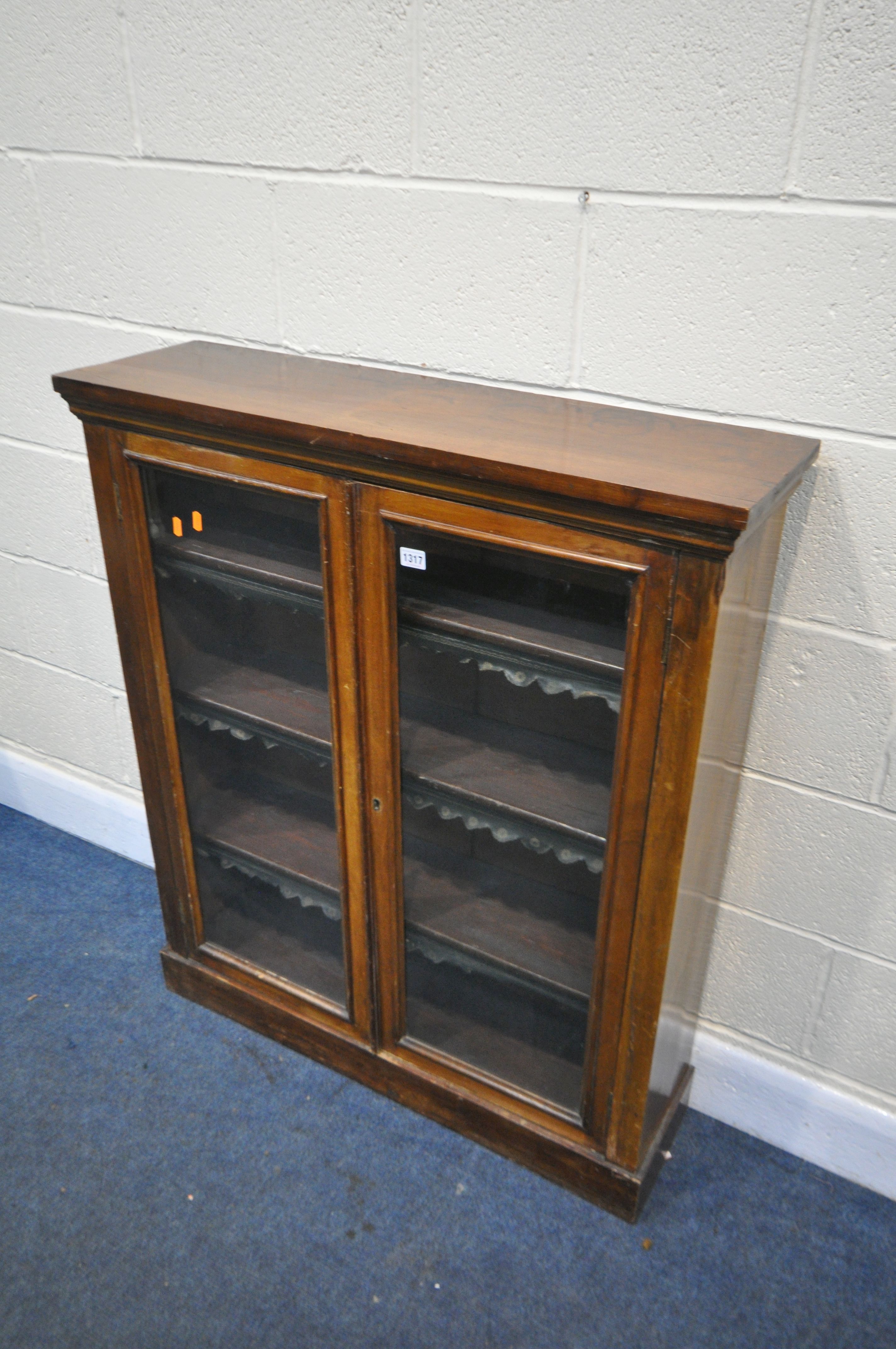 A VICTORIAN MAHOGANY GLAZED DOUBLE DOOR BOOKCASE, with three adjustable shelves, width 90cm x
