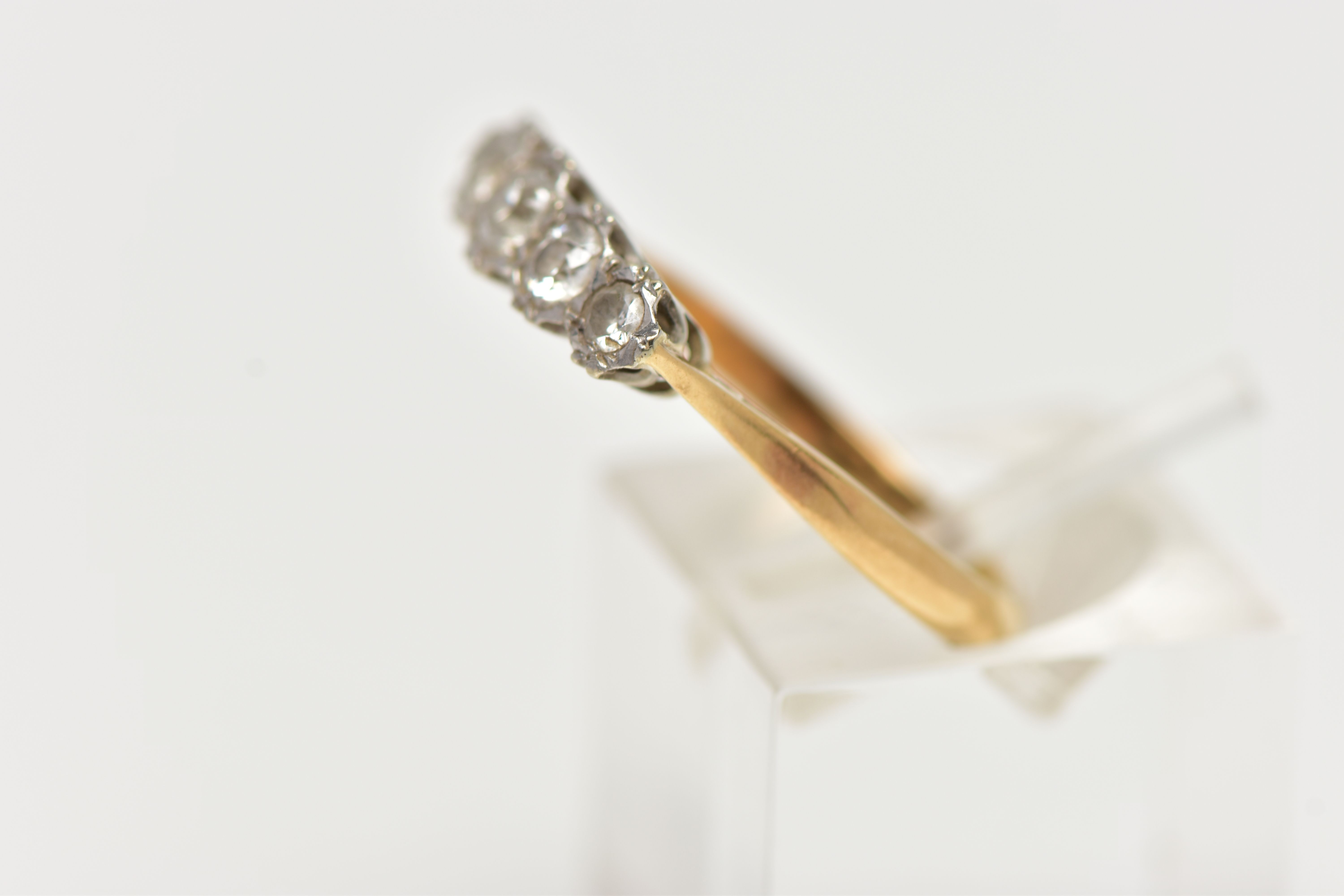 A YELLOW METAL, FIVE STONE DIAMOND RING, set with five graduating, old cut diamonds, estimated total - Image 2 of 4