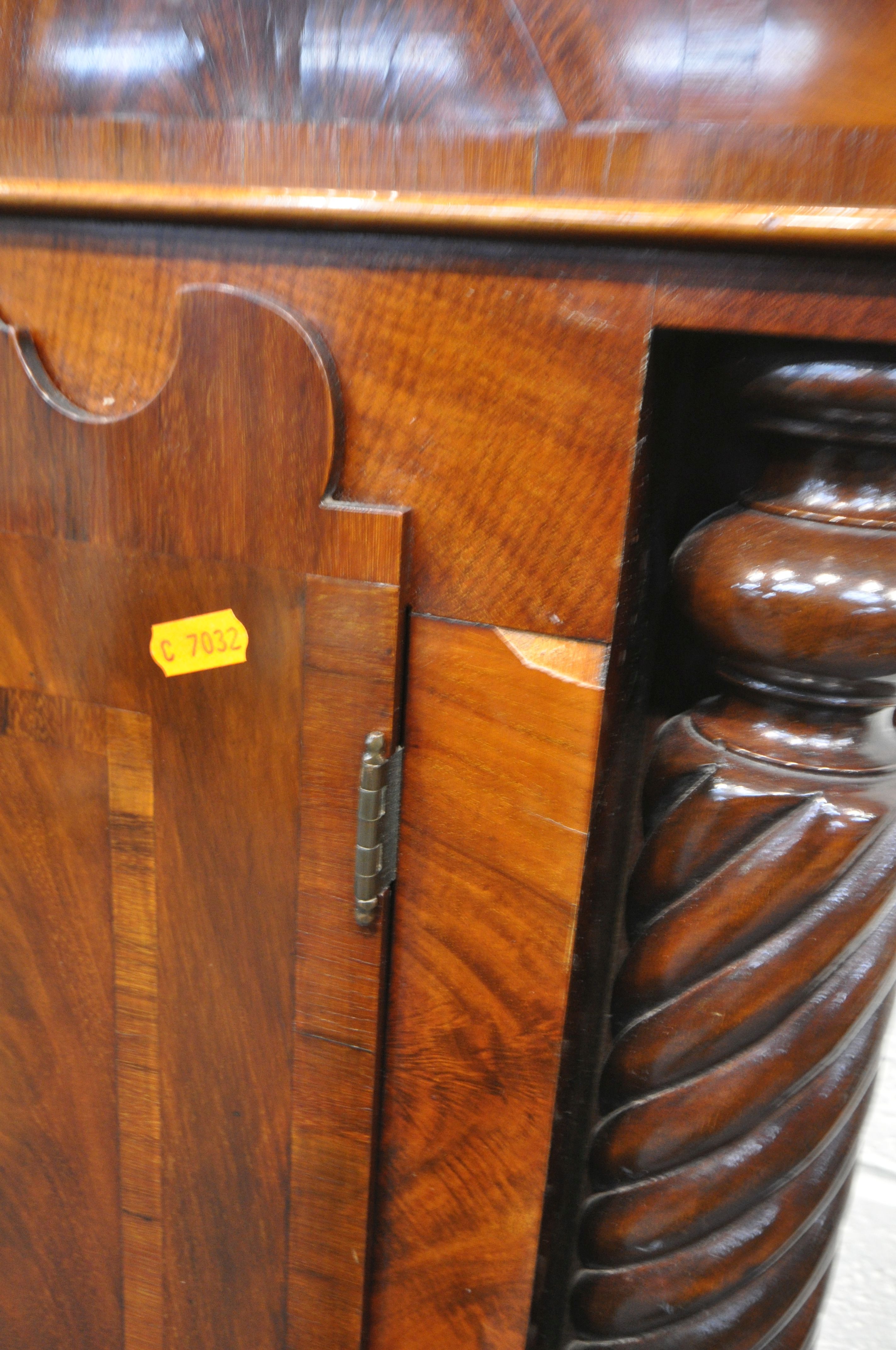 A GEORGIAN FLAME MAHOGANY EIGHT DAY LONGCASE CLOCK, the hood with a swan neck pediment, barley - Image 7 of 8