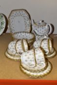 A SPODE 'FLEUR DE LYS GOLD' PATTERN TEA SET, comprising a bread and butter plate, teapot, milk