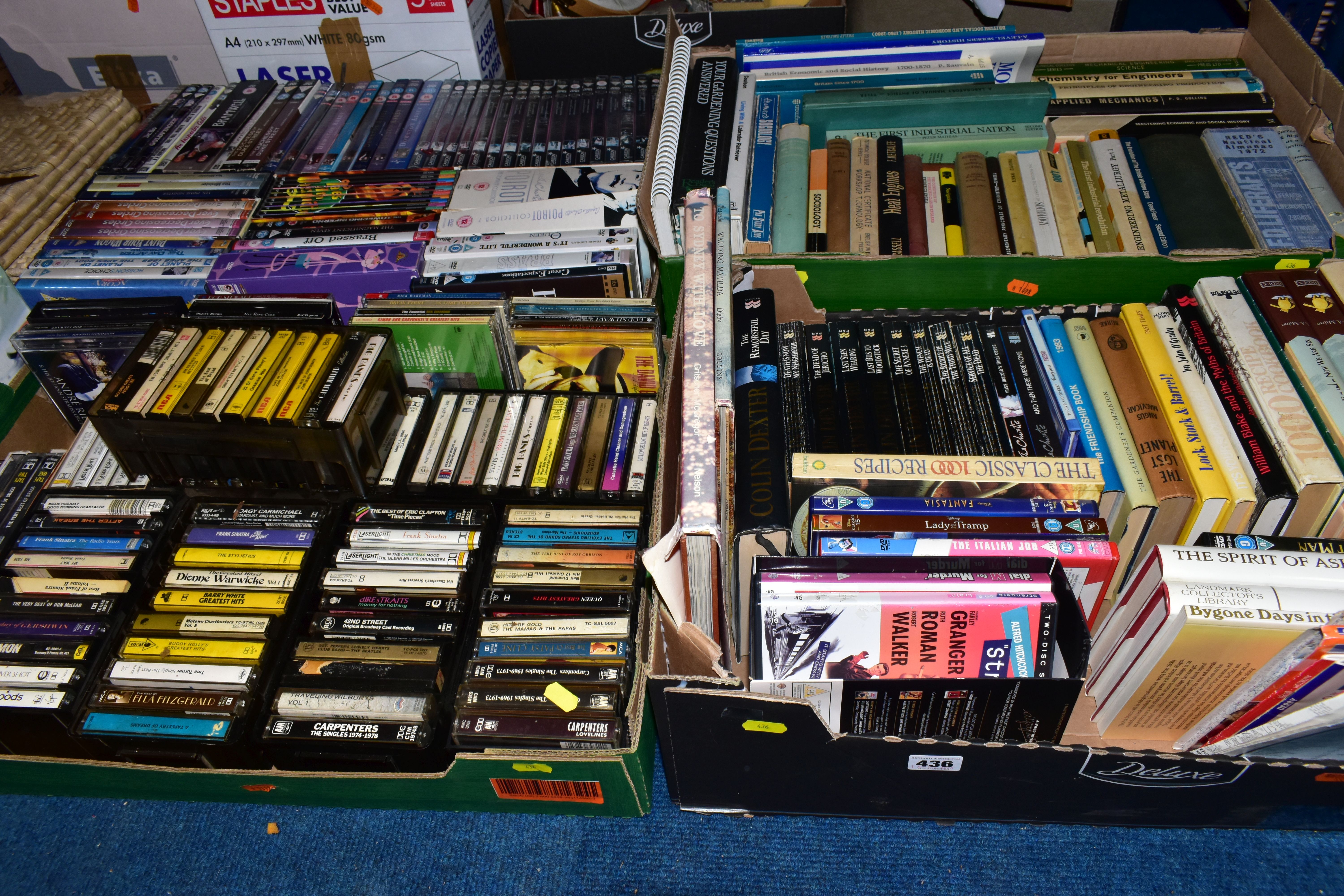 FOUR BOXES containing a mixture of Books, DVD's and Cassette Tapes, the books are a miscellaneous