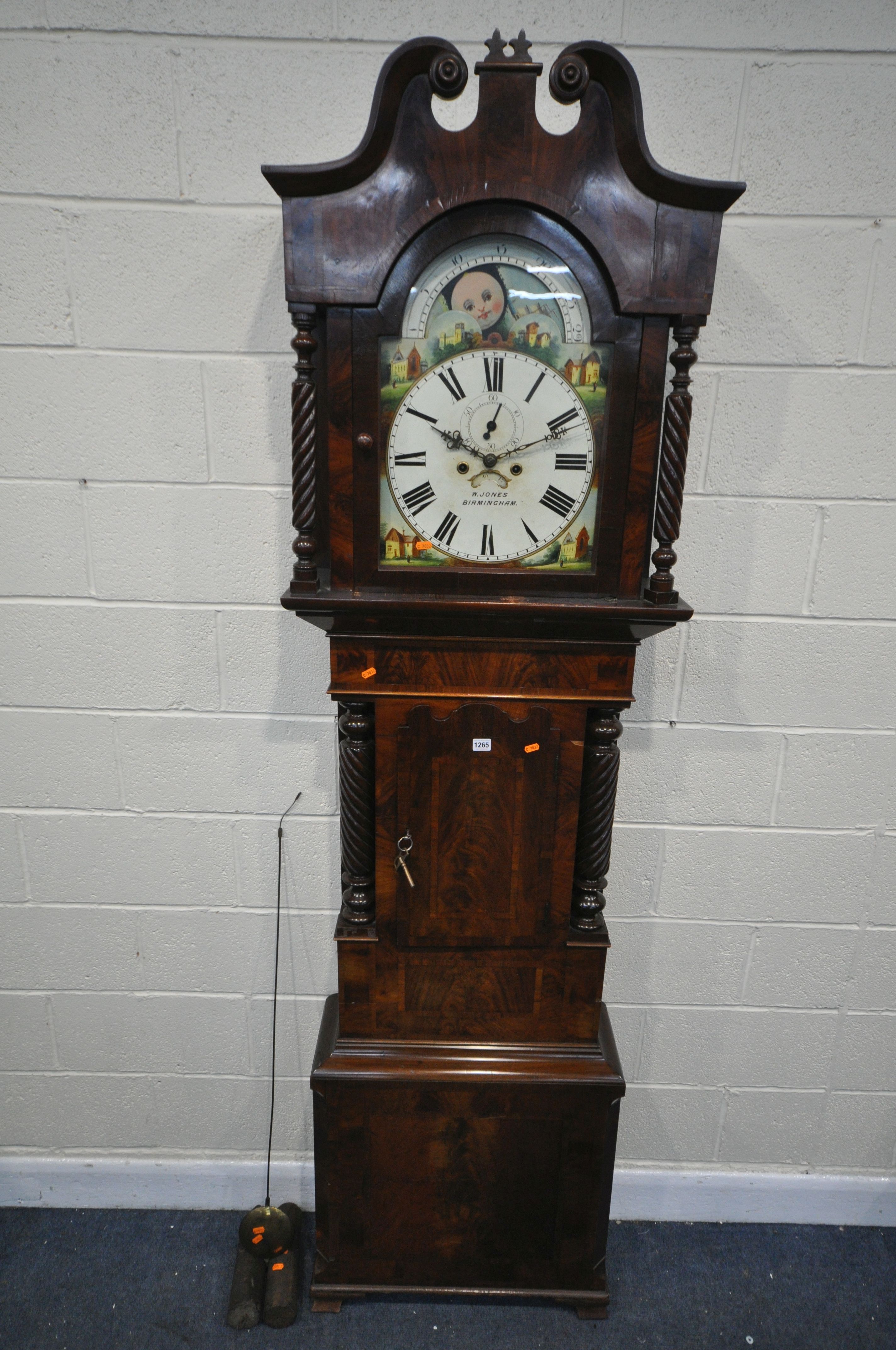 A GEORGIAN FLAME MAHOGANY EIGHT DAY LONGCASE CLOCK, the hood with a swan neck pediment, barley