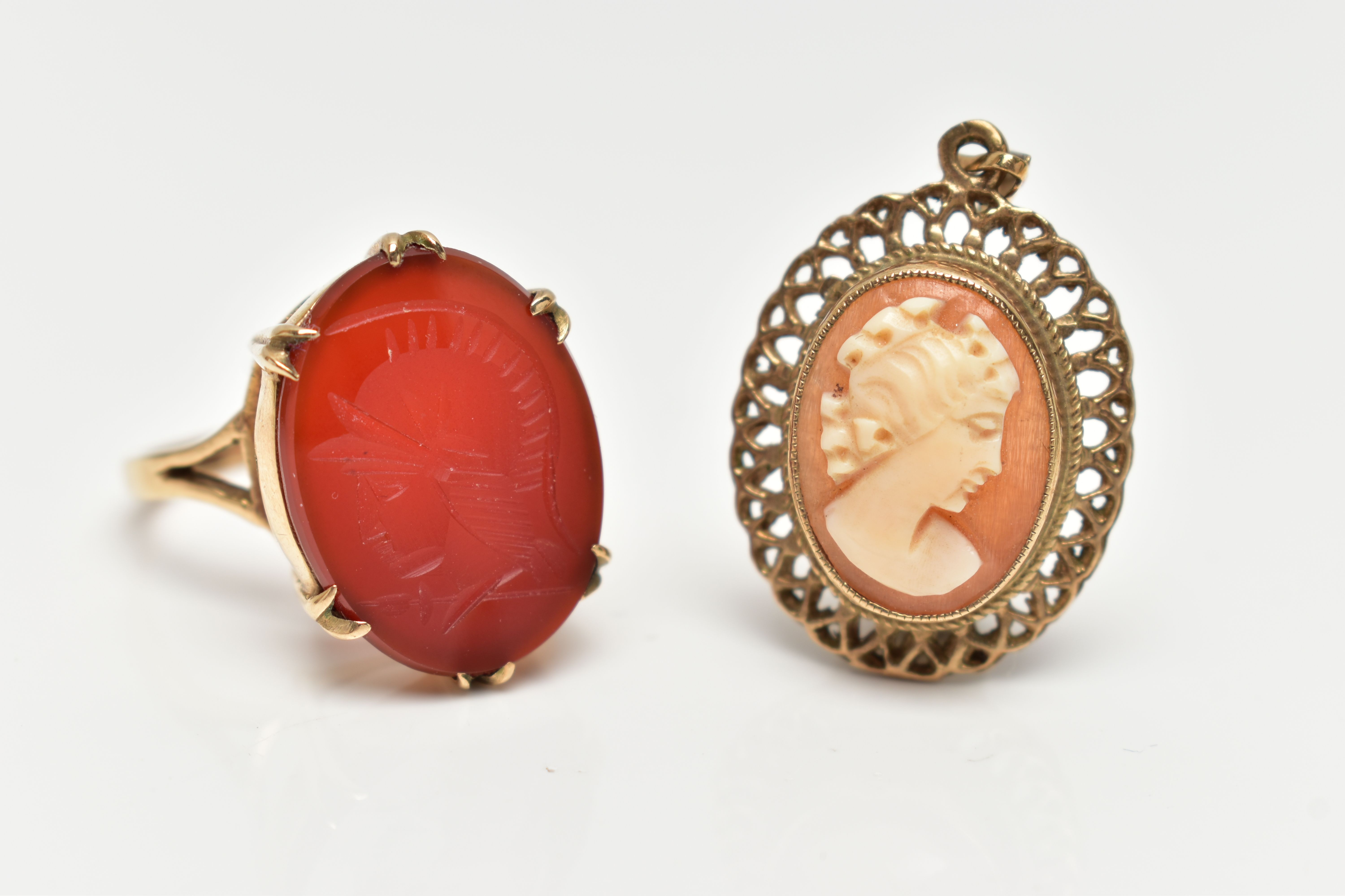 A 9CT GOLD, INTAGLIO RING AND A CAMEO PENDANT, the oval intaglio carnelian, double six claw set to