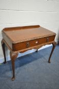 A QUEEN ANNE STYLE WALNUT SIDE TABLE, with two drawers, on cabriole legs, width 108cm x depth 98cm x