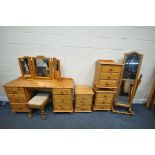 A SELECTON OF PINE FURNITURE, to include a dressing table, with six drawers, length 140cm x depth