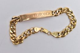 A 9CT YELLOW GOLD, IDENTIFICATION BRACELET, panel engraved 'A.E.Hitchcock', fitted to a hollow