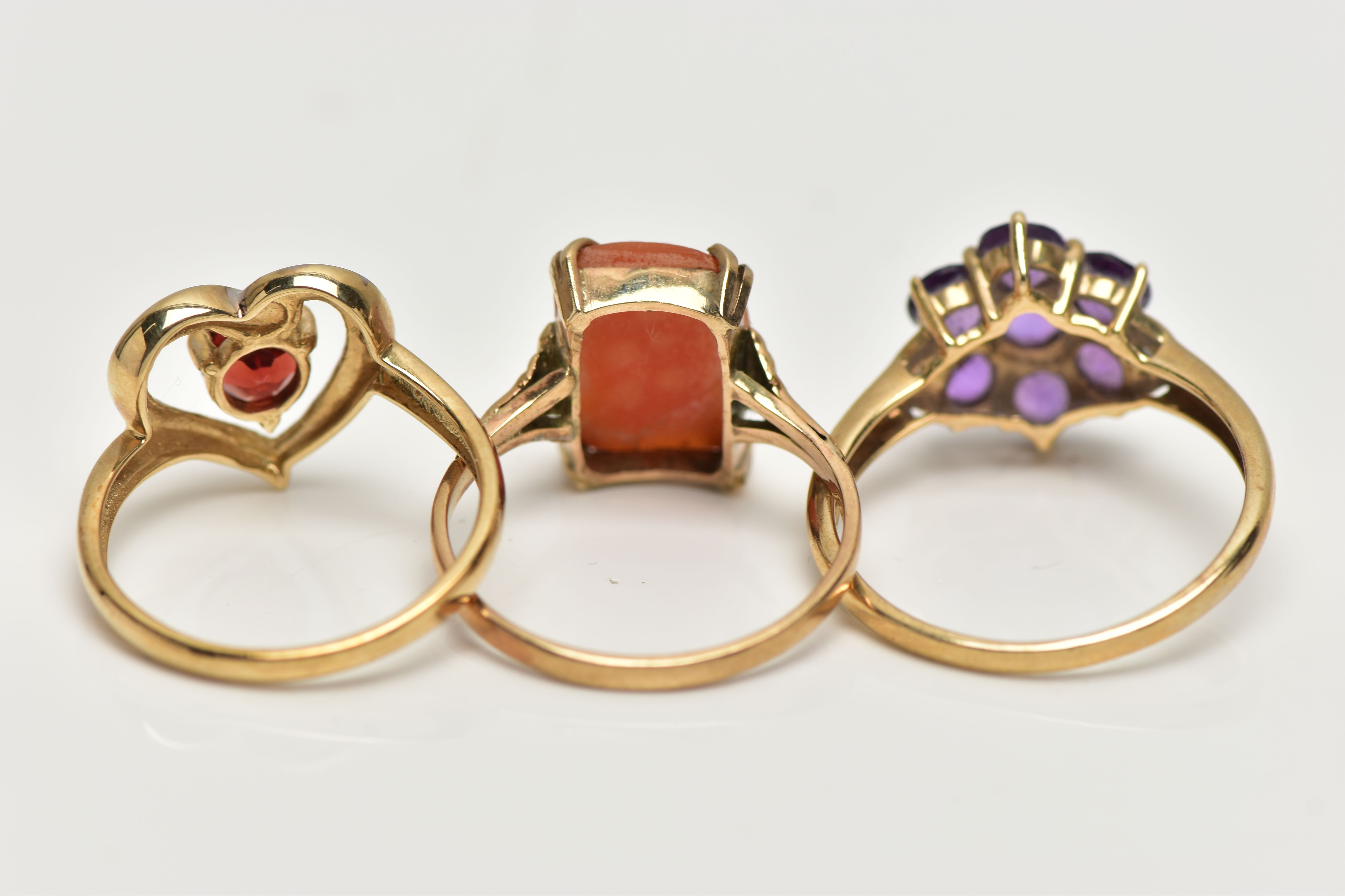 THREE 9CT GOLD GEM SET RINGS, the first a garnet and single cut diamond, openwork heart ring, - Image 4 of 4