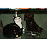 TWO CERAMIC PET FIGURES, comprising a Winstanley black Labrador, size 5, height 21cm, with orange