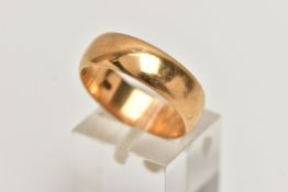 A BAND RING, with personal inscription to the inner band, stamped 18ct, ring size Q, width 7mm,