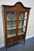 AN EDWARDIAN MAHOGANY MARQUETRY INLAID TWO DOOR DISPLAY CABINET, enclosing two shelves, on square