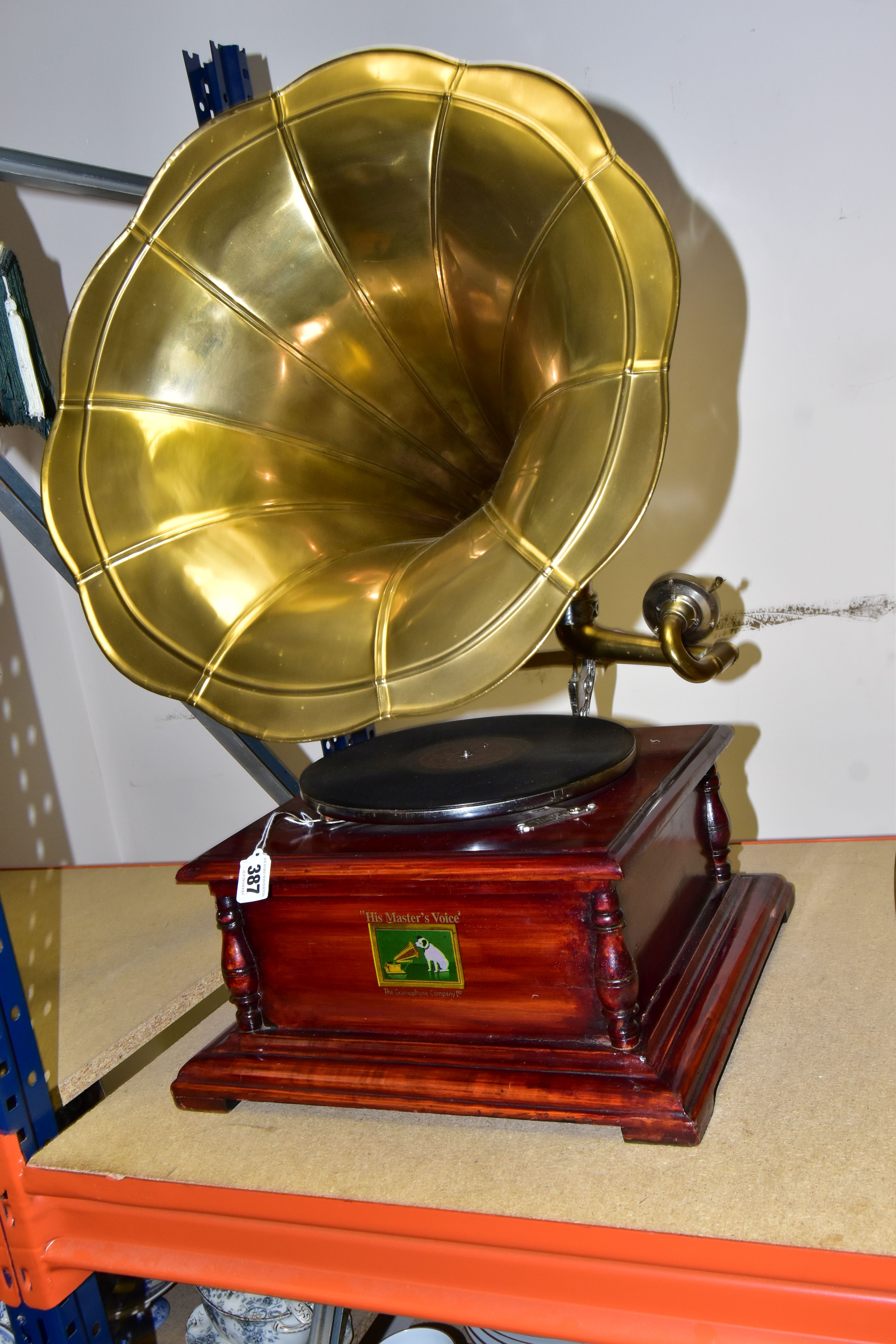 A REPRODUCTION 'HIS MASTER'S VOICE' GRAMOPHONE, wooden hinged base containing mechanism and