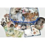 A BISCUIT TIN CONTAINING MIXED COINAGE TOGETHER WITH SOME DISTRESSED BANKNOTES