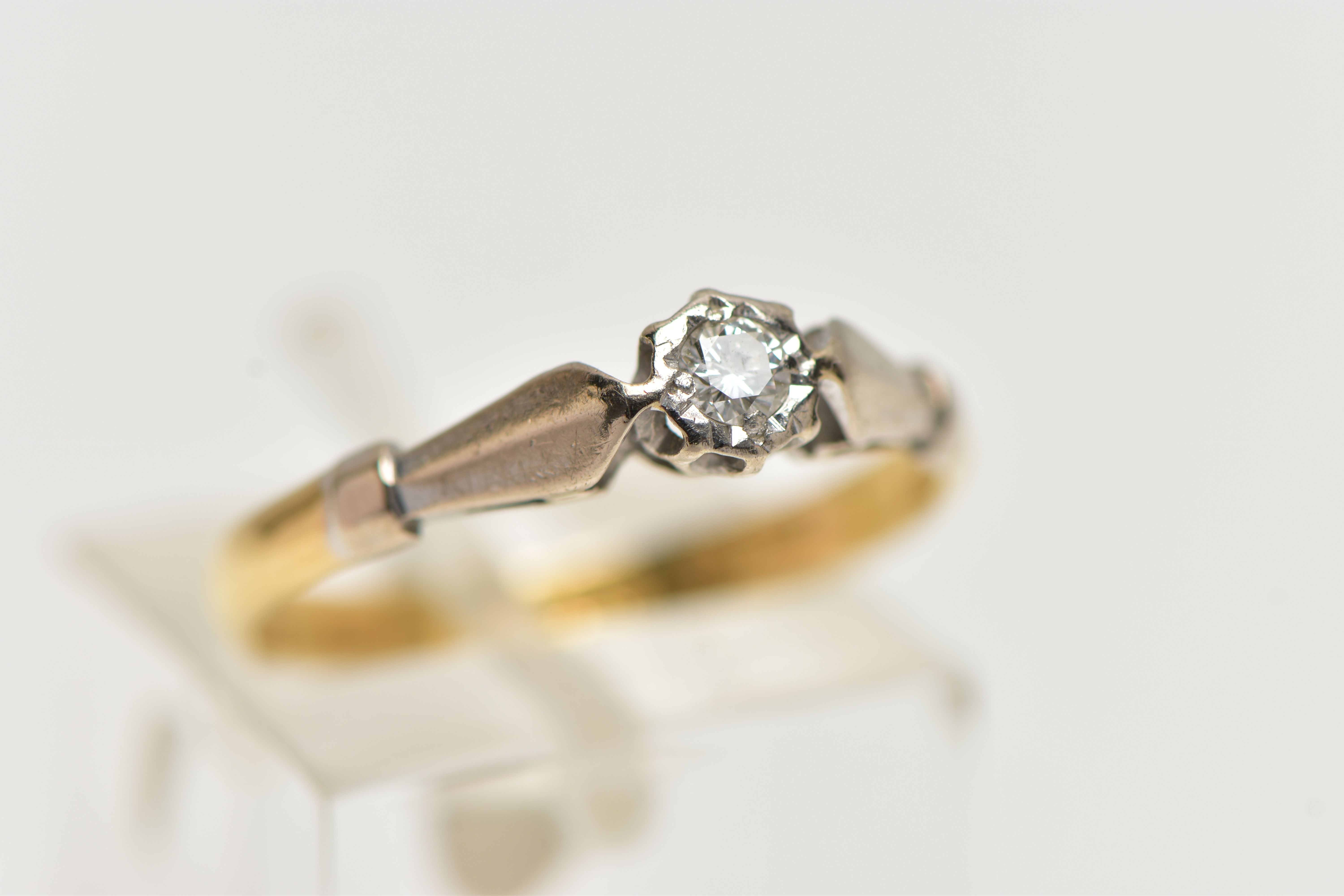 AN 18CT GOLD, SINGLE STONE DIAMOND RING, a round brilliant cut diamond set in a white metal illusion - Image 4 of 4