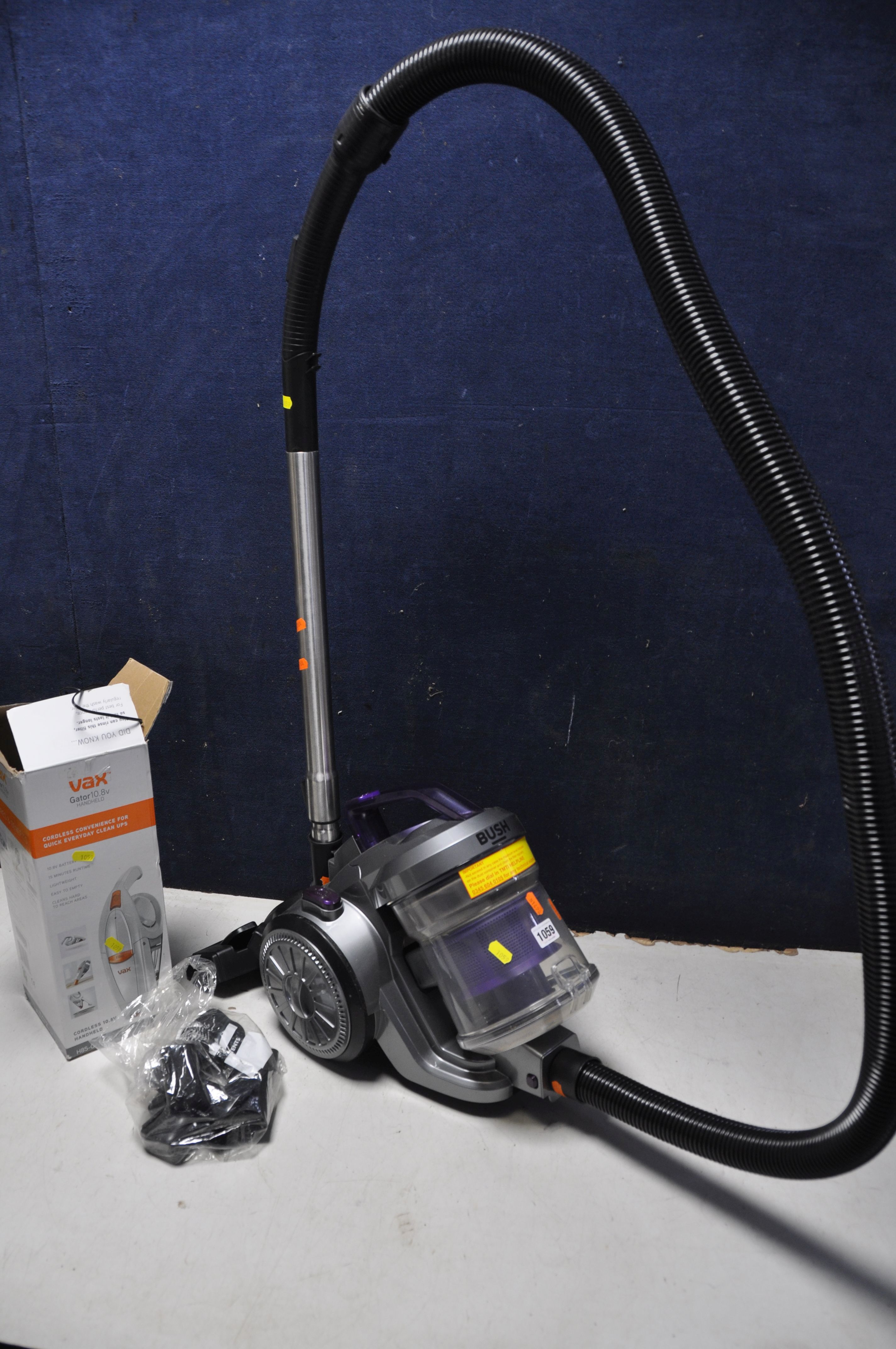 A BUSH BT-ZW-9031SO8 VACUUM CLEANER along with a Vax H85-GA-B10 cordless handheld vacuum cleaner (