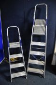 TWO SETS OF ALUMINIUM STEPLADDERS to include a set of Abru four step stepladders and a smaller set