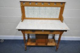 A SATINWOOD MARBLE TOP WASH STAND, with a tiled raised back, a single frieze drawer, above a