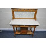 A SATINWOOD MARBLE TOP WASH STAND, with a tiled raised back, a single frieze drawer, above a