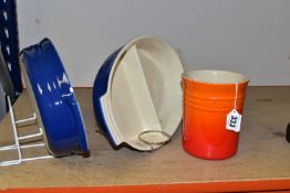A GROUP OF LE CREUSET OVENWARE, comprising a 'Flame' orange stoneware utensil pot 04.05, together