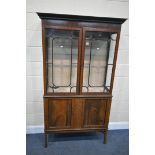 AN EARLY 20TH CENTURY MAHOGANY DISPLAY CABINET, with a fixed over hanging cornice, two astragal