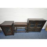 AN OAK LEAD GLAZED TWO DOOR BOOKCASE, width 107cm x depth 33cm x height 99cm, a hi-fi cabinet, and