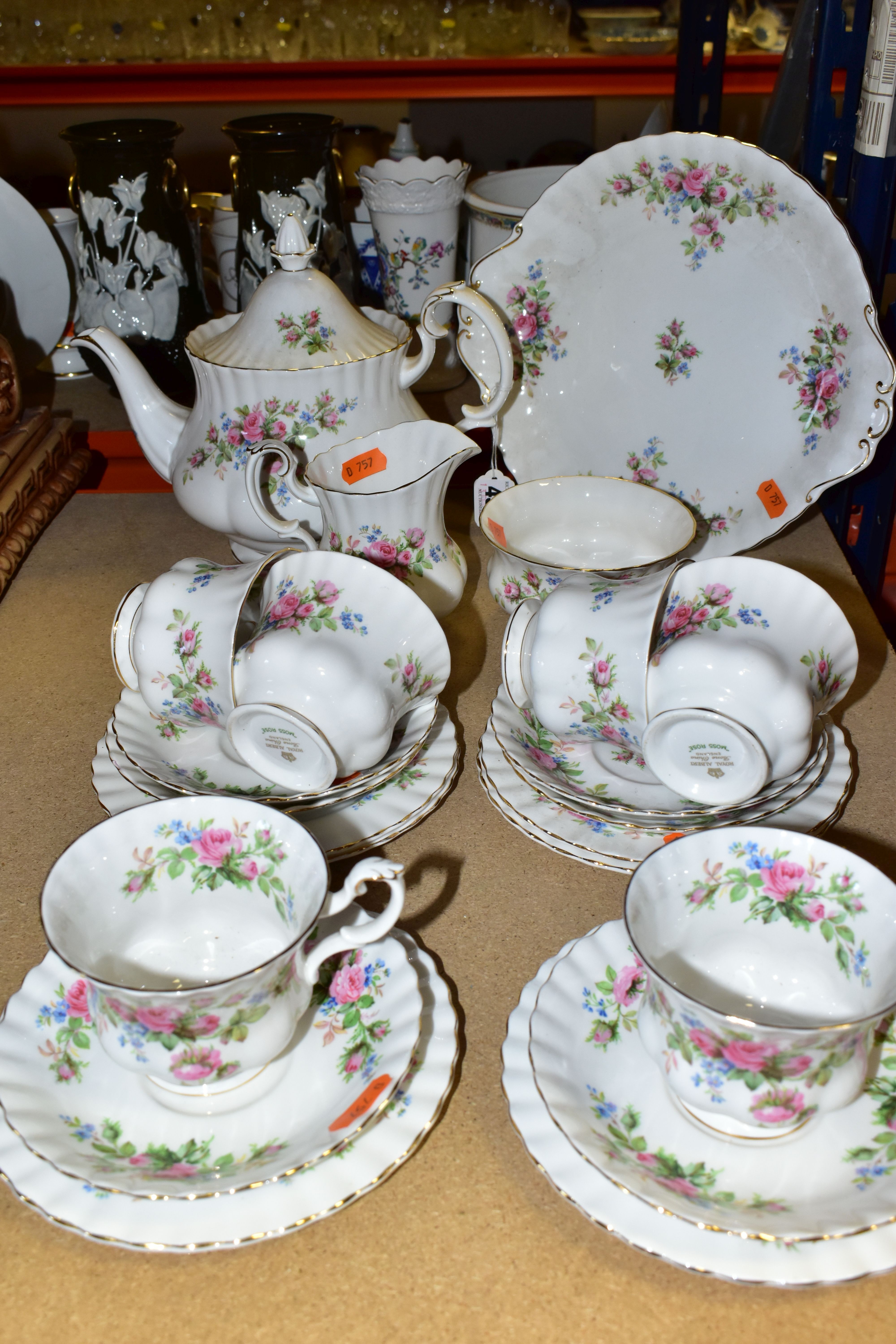 A TWENTY TWO PIECE ROYAL ALBERT 'MOSS ROSE' PATTERN TEA SET, comprising a teapot (small firing crack