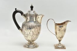 A LATE VICTORIAN SILVER HOT WATER JUG AND A LATE VICTORIAN GEORGIAN STYLE HELMET SHAPED CREAM JUG,