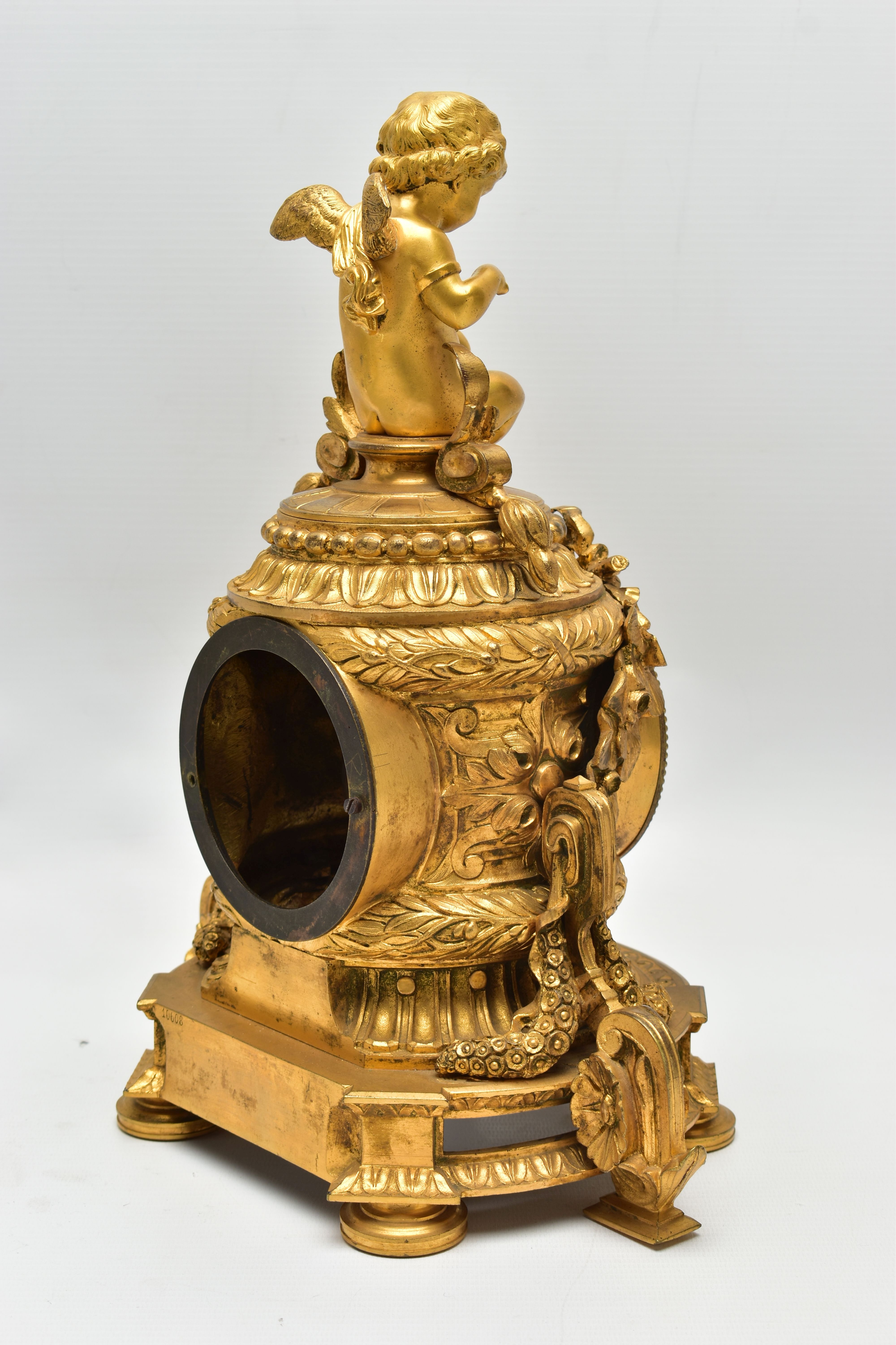 A LATE 19TH CENTURY FRENCH ORMOLU MANTEL CLOCK OF SHAPED CYLINDRICAL FORM, the circular top with - Image 8 of 16