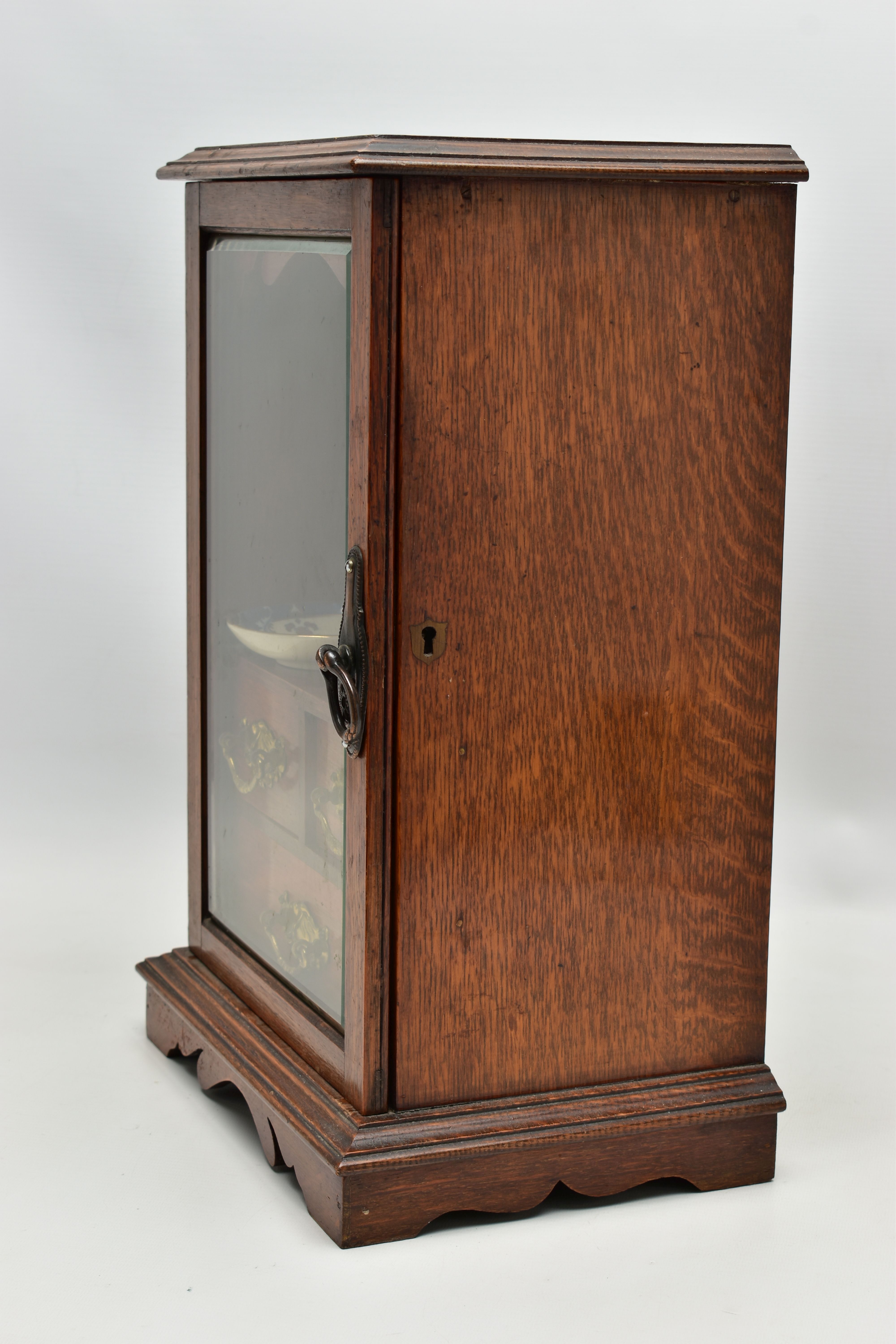 A LATE VICTORIAN OAK CASED SMOKERS CABINET, the bevel edged glazed door opening to reveal a pipe - Image 5 of 11