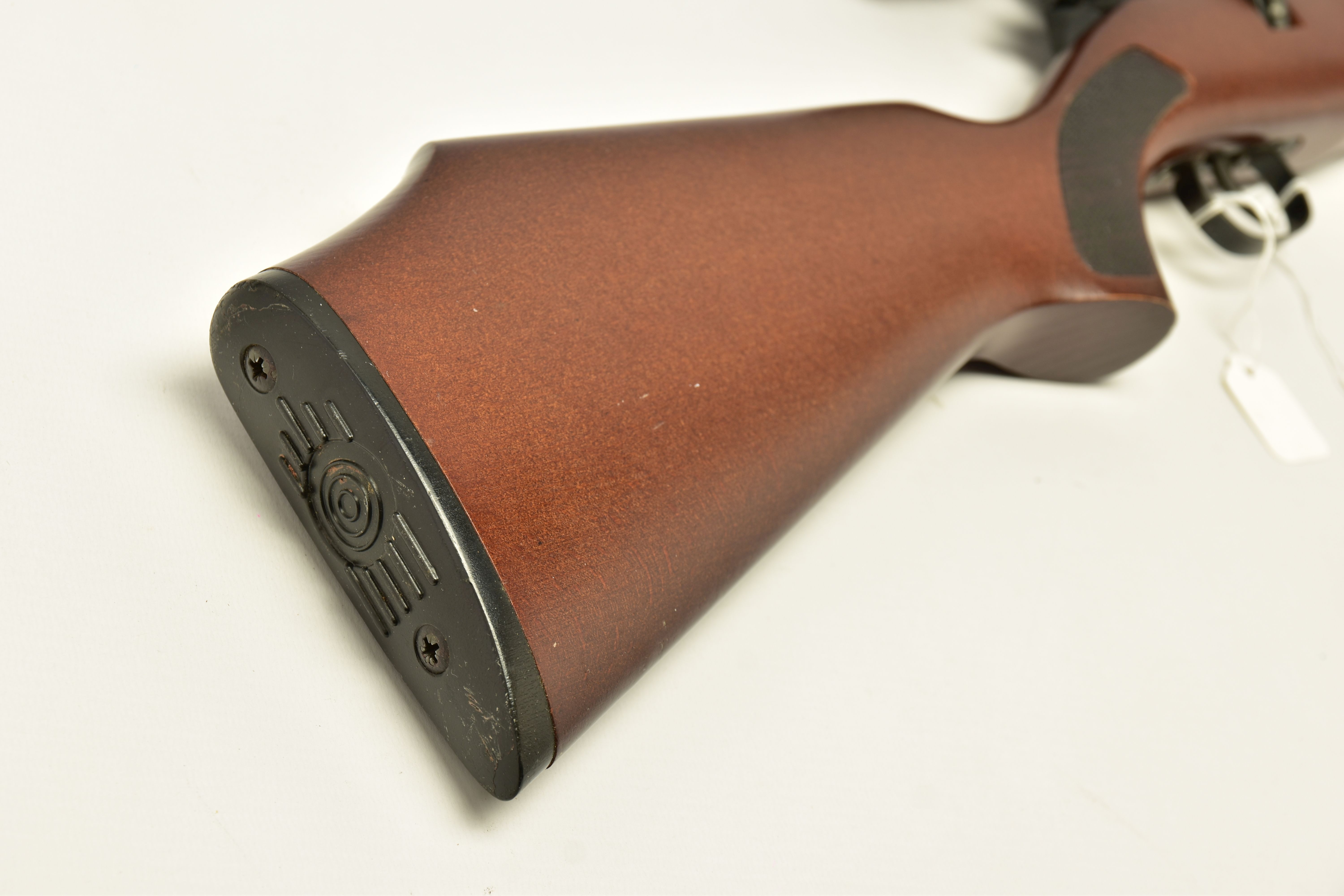 A .22 '' ROTARY MAGAZINE PUMP UP AIR RIFLE fitted with a beech stock, in working order and excellent - Image 9 of 9
