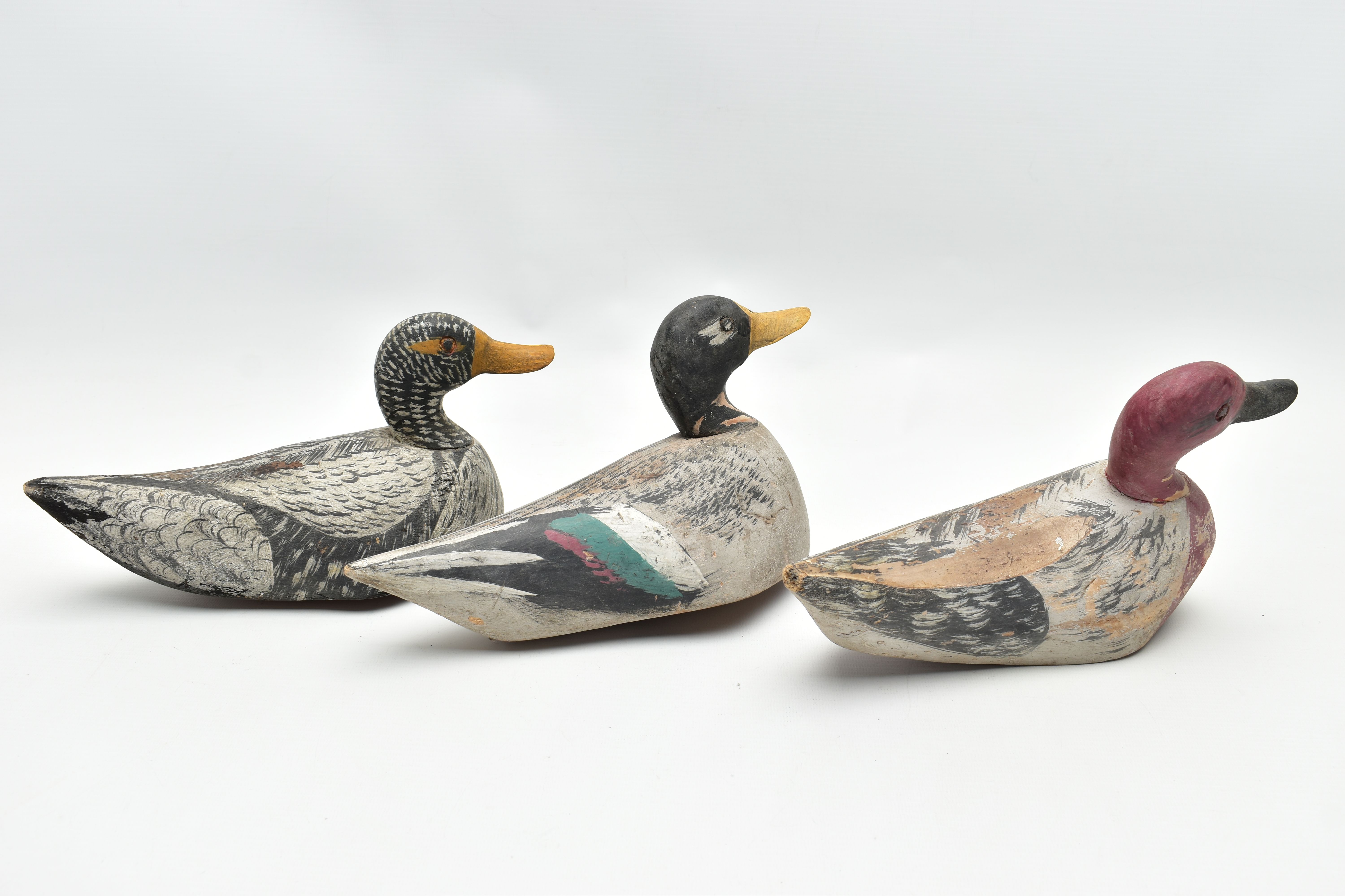 THREE CARVED WOODEN DECOY DUCKS WITH POLYCHROME PAINTED DECORATION, impressed circle eyes, - Image 4 of 8