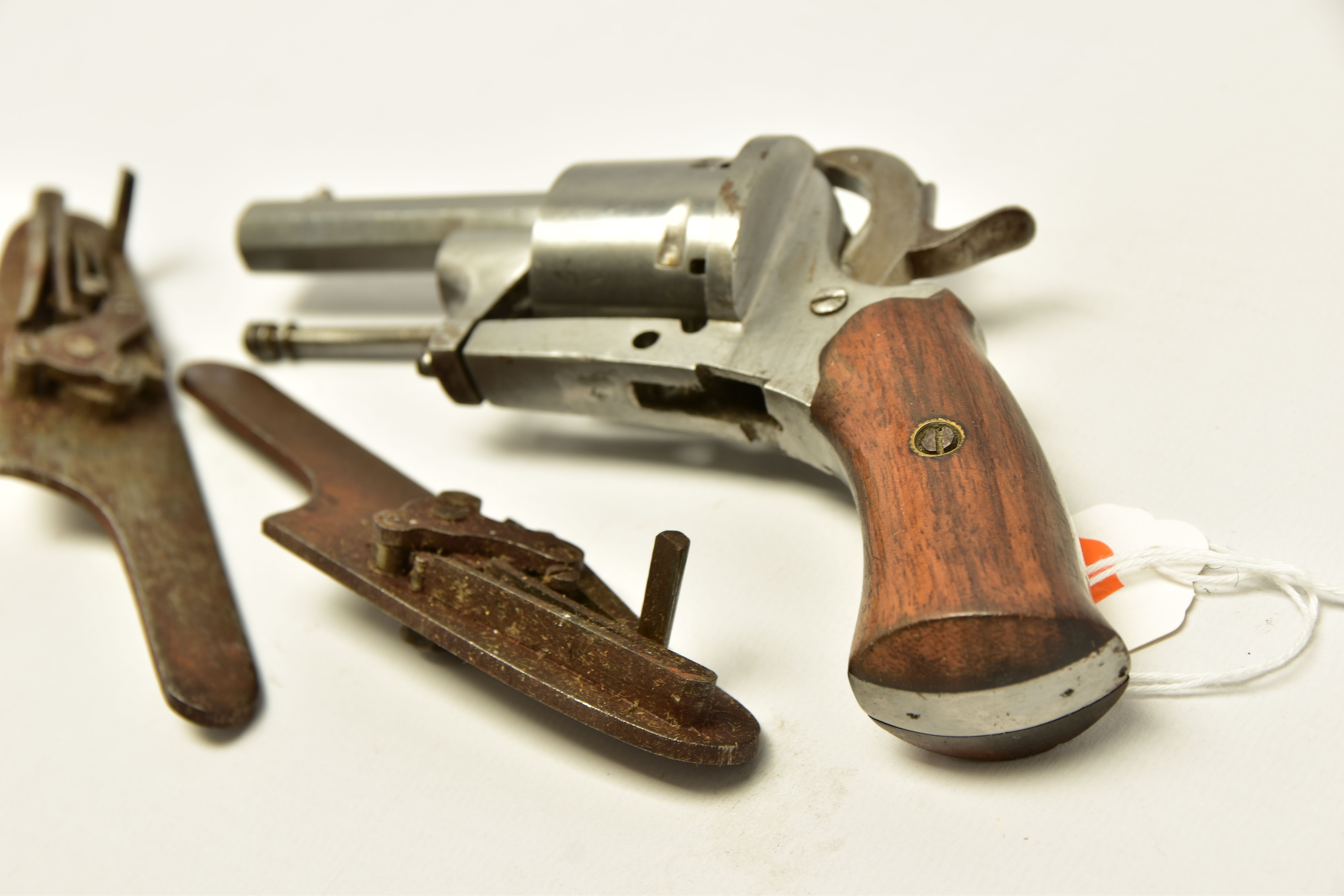 AN ANTIQUE 7MM BELGIAN PROVED PIN-FIRE REVOLVER, partly dismantled and missing its loading gate - Image 3 of 7