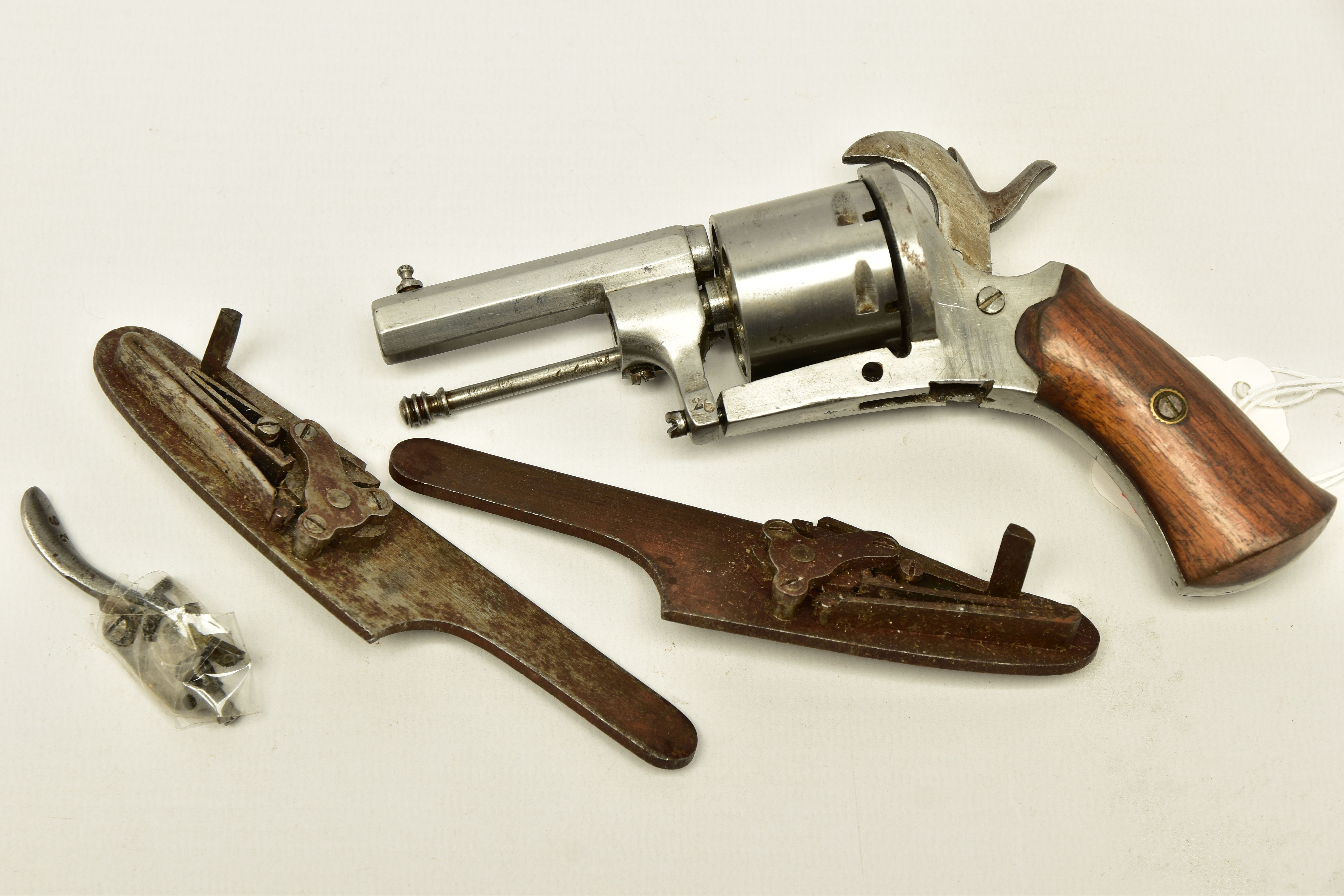 AN ANTIQUE 7MM BELGIAN PROVED PIN-FIRE REVOLVER, partly dismantled and missing its loading gate
