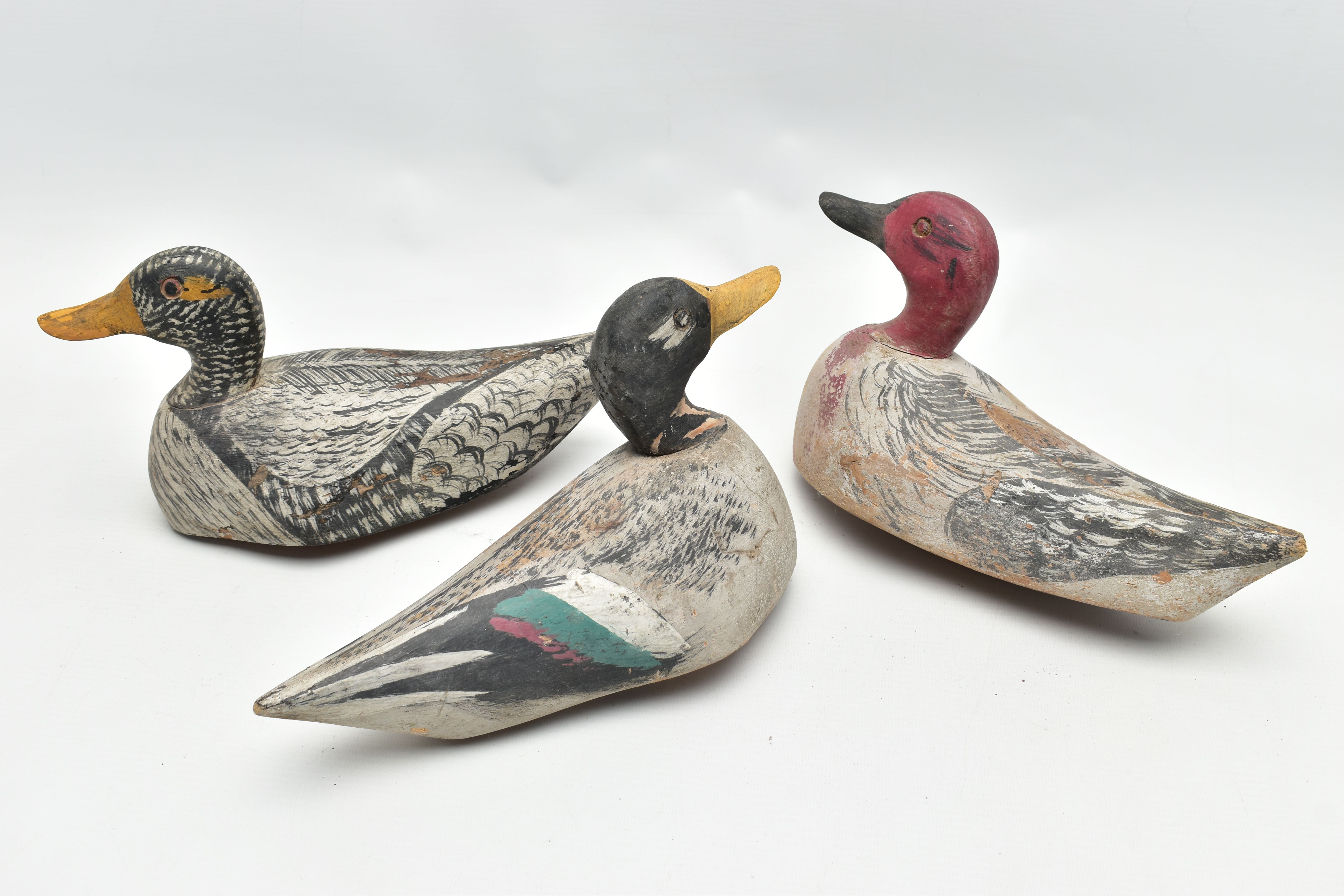 THREE CARVED WOODEN DECOY DUCKS WITH POLYCHROME PAINTED DECORATION, impressed circle eyes, - Image 8 of 8