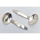 A PAIR OF DANISH STERLING SILVER CADDY SPOONS BY F. HINGELBERG, bears import marks for R C P Ltd,