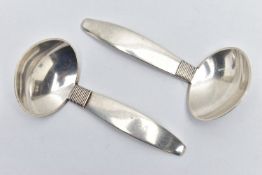 A PAIR OF DANISH STERLING SILVER CADDY SPOONS BY F. HINGELBERG, bears import marks for R C P Ltd,