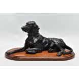 AFTER NIKOLAI IVANOVICH LIBERICH (1828-1883) a cast iron figure of a recumbent bloodhound, bearing