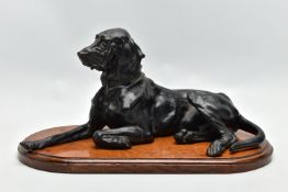 AFTER NIKOLAI IVANOVICH LIBERICH (1828-1883) a cast iron figure of a recumbent bloodhound, bearing
