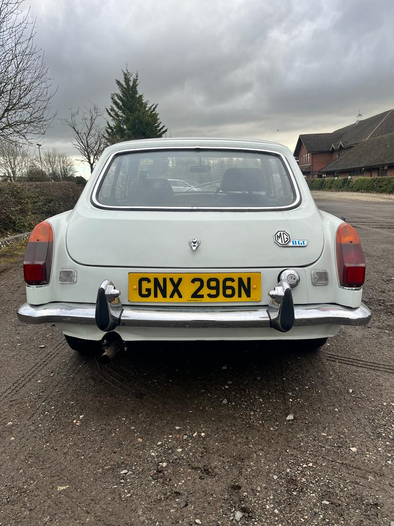 A BRITISH CLASSIC MGB GT SPORTS CAR, mark lll, in white and silvered trim, black leather and red - Image 9 of 24