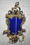 AN EARLY TO MID 20TH CENTURYCENTURY GILTWOOD GIRANDOLE, in the Rococo Revival style, shaped