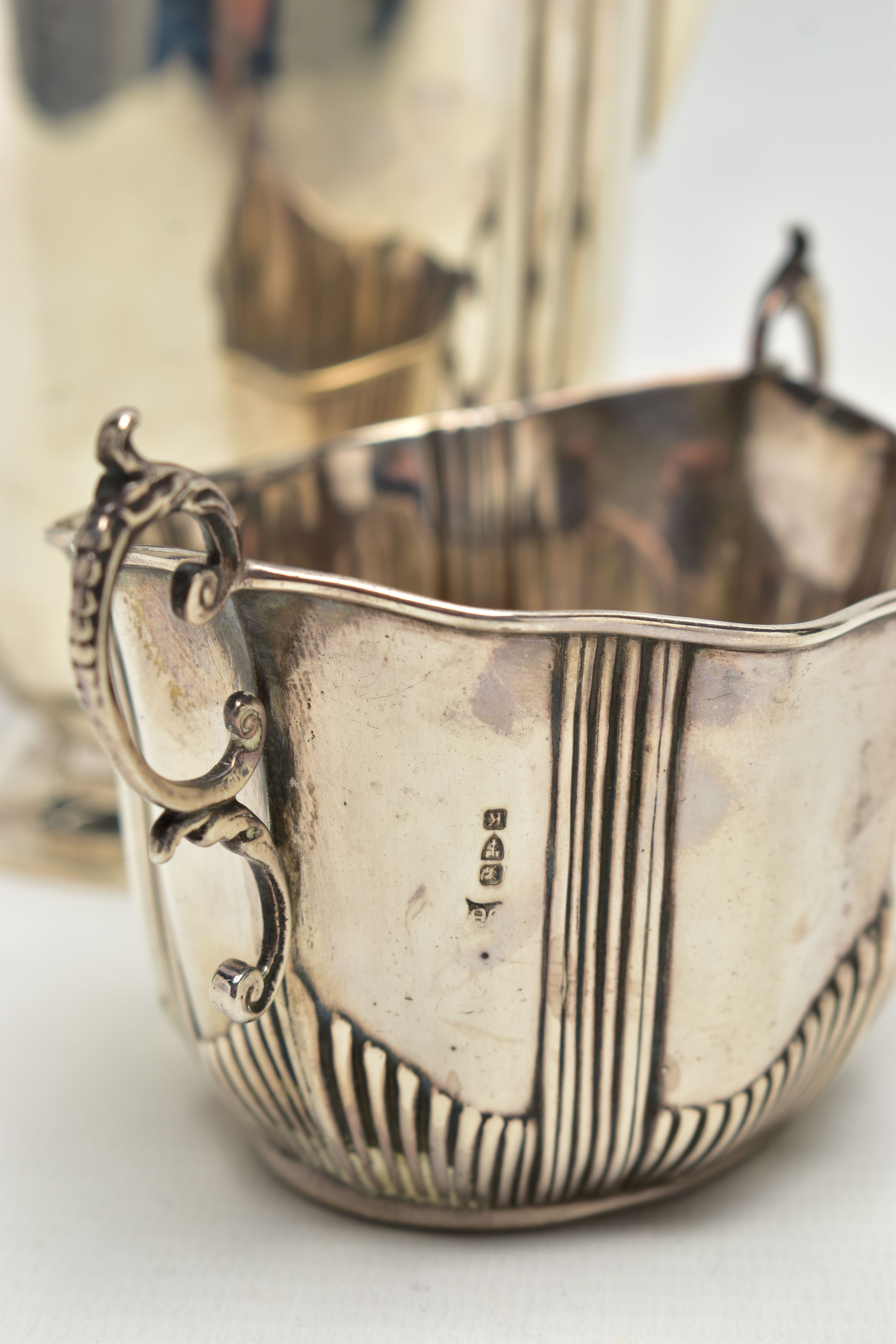 A GEORGE V SILVER HOT WATER JUG AND A LATE VICTORIAN TWIN HANDLED SUGAR BOWL, the hot water jug of - Image 4 of 10