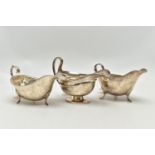 THREE 20TH CENTURY OVAL SILVER SAUCE BOATS OF VARYING DESIGNS, one on an oval foot, stamped 987L