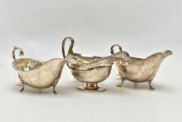 THREE 20TH CENTURY OVAL SILVER SAUCE BOATS OF VARYING DESIGNS, one on an oval foot, stamped 987L