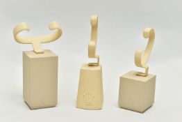 THREE ROLEX WATCH DISPLAY STANDS, of various sizes, each with Rolex symbol (3) (Condition Report: