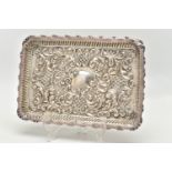 AN EDWARDIAN SILVER TRAY, rectangular form, scalloped edges, embossed with scrolling foliage and