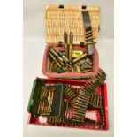 A HAMPER AND CONTAINER OF INERT METALLIC CARTRIDGE CASES, they include a large quantity of 7.62 NATO