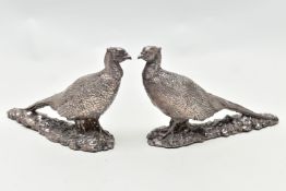A PAIR OF ELIZABETH II FILLED SILVER TABLE ORNAMENTS IN THE FORM OF COCK PHEASANTS STANDING ON A
